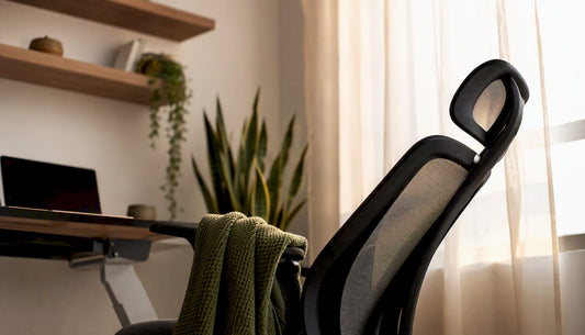 Ergonomic chair partly reclined in warm home office
