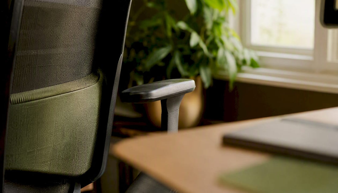Close side view of ergonomic chair armrest and lumbar area